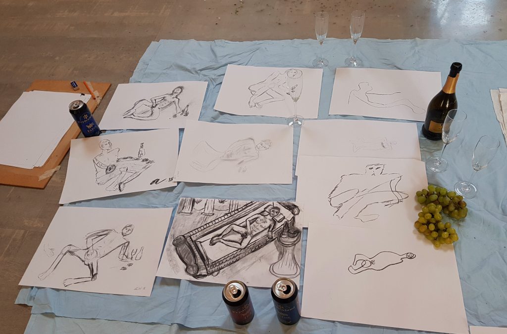 Both the football guys and I was drawing. They had no experience, but after a few hours of teaching their drawings improved a lot!